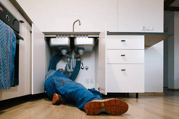 Professional Emergency Plumber technician working in Scipio, IN